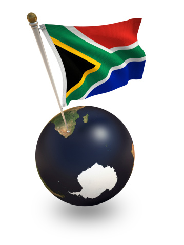 The national flag of South Africa and it's location on planet earth isolated on white background. Clipping path supplied for your convenience.