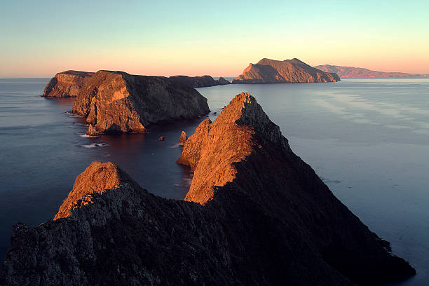 Sunrise on Inspiration Point of Anacapa Island Great color refection on the island chain of Channel Island National Park at the sun rise from the Inspiration point of Anacapa Island. santa barbara california photos stock pictures, royalty-free photos & images