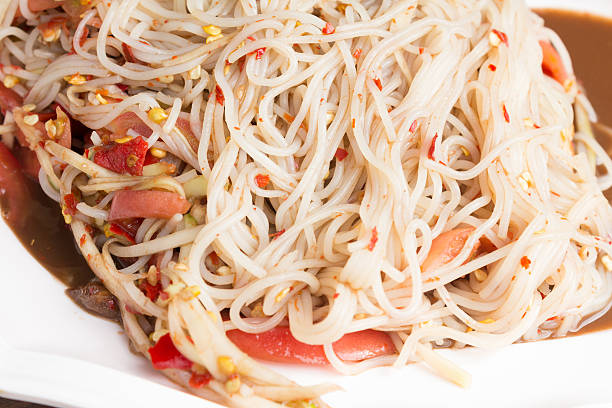 Papaya salad or Som Tum (traditional thai food) stock photo