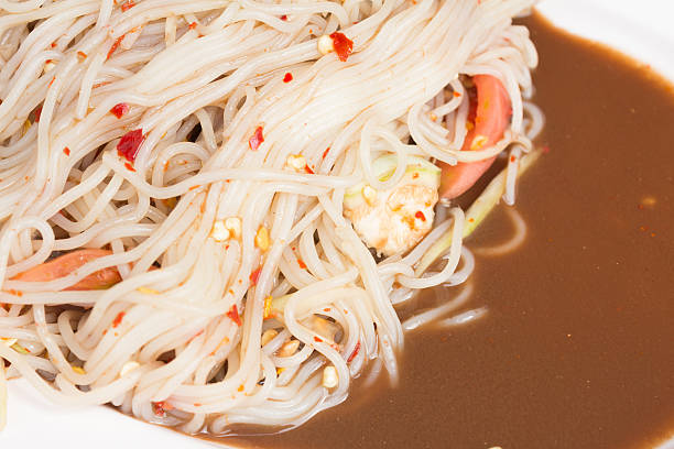 Papaya salad or Som Tum (traditional thai food) stock photo