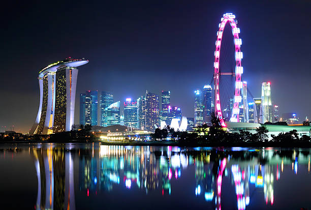 istock Singapore city skyline at night 459279649