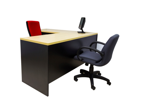 Monitor on desk at modern office in white with clipping path