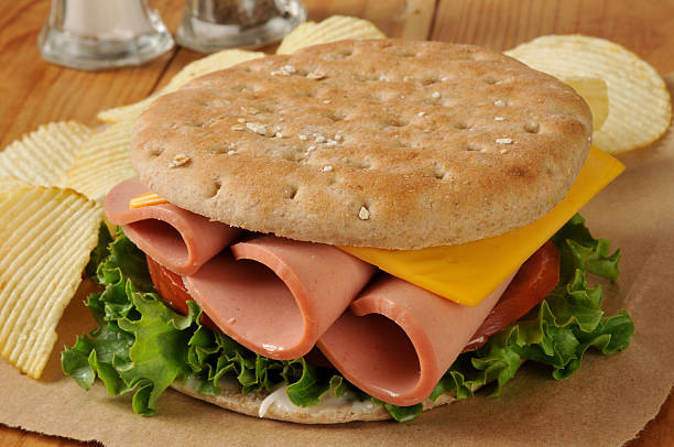 Baloney sandwich A baloney sandwich on multi-grain sandwich bread baloney stock pictures, royalty-free photos & images