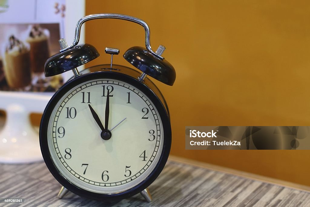 clock black clock on the table Alarm Stock Photo
