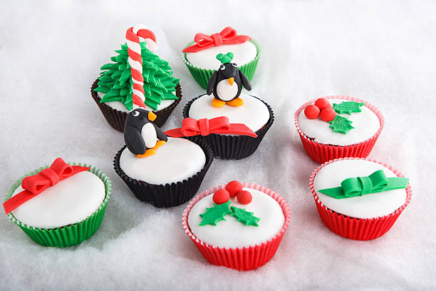 istock Christmas tree cupcake with white fondant frosting 459287321