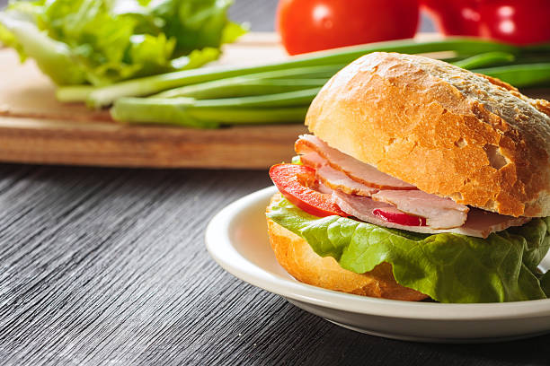 istock Sandwich with fresh vegetables, cheese and ham 459288101