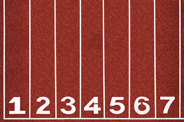 Running track with number 1-7, background. White number on red running track. running track stock pictures, royalty-free photos & images