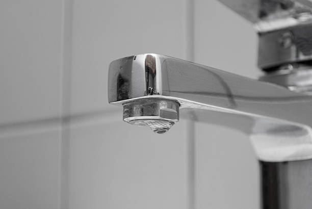 istock Water dripping from a faucet 459291965