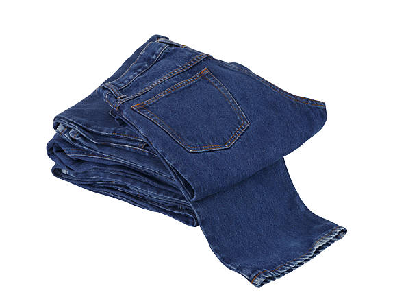 istock lot of blue jeans isolated on white background 459292255