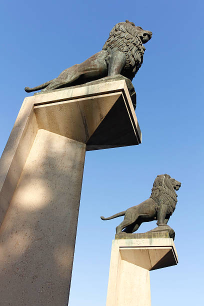 istock sculptures of lions on large pedestals 459294473