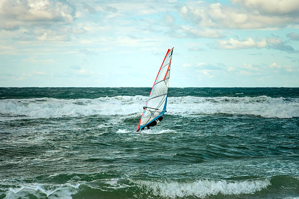 istock Sea Windsurfing Sport sailing water active leisure Windsurfer training 459294883