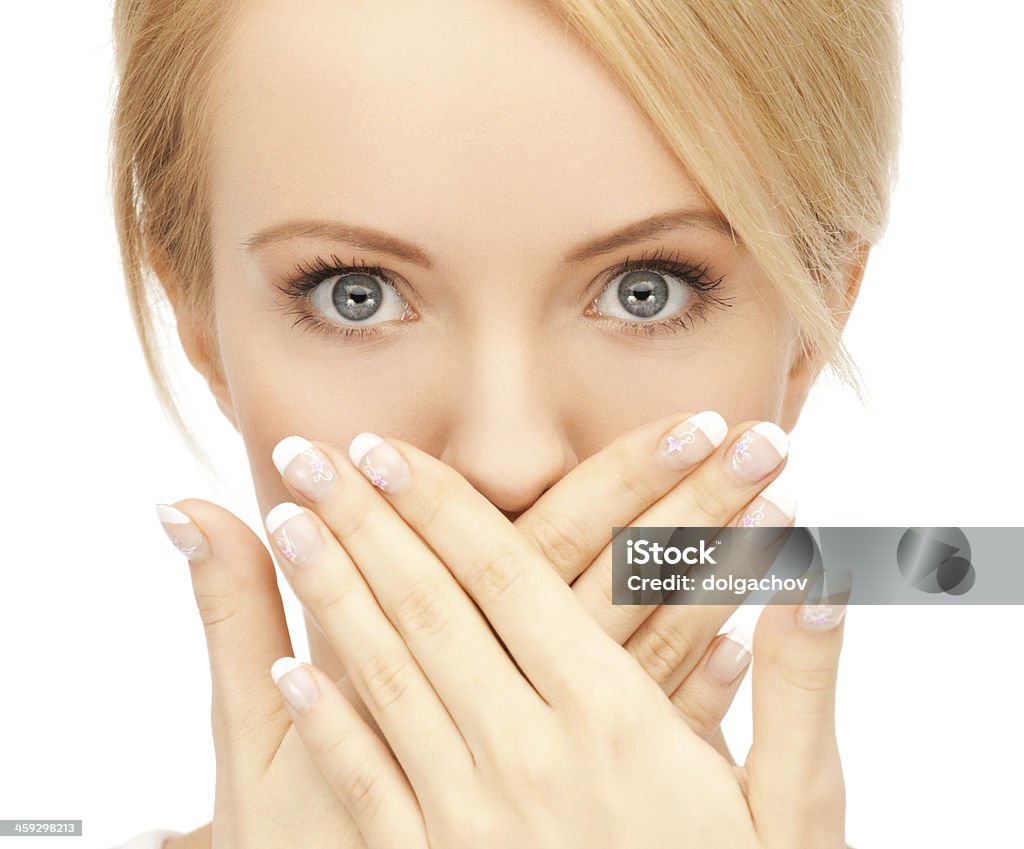 amazed woman with hand over mouth picture of amazed woman with hand over mouth Adult Stock Photo