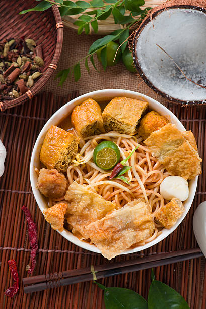 istock asam laksa noodle ,Penang style with raw ingredients on backgrou 459298389