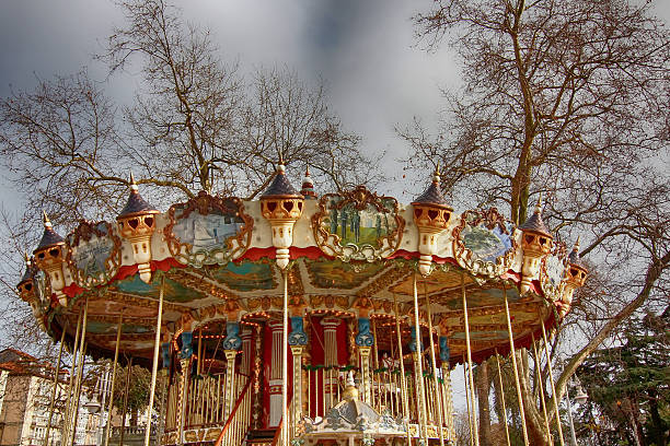 istock beautiful carousel with ancient drawings and decorations 459302627