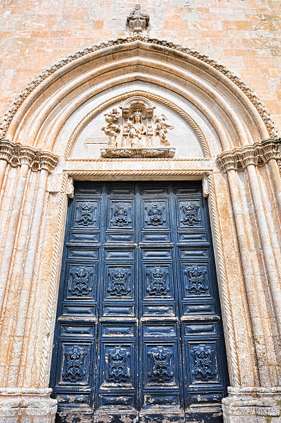 Main door of the Ostuni's cathedral stock photo