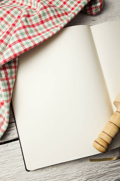 istock Blank recipe book on wooden table 459316499