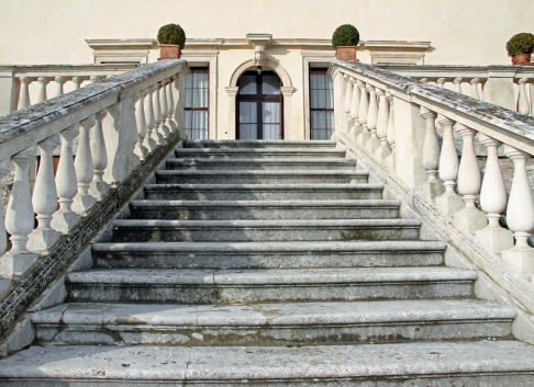 stone pasos que conduce a la entrada de una villa photo