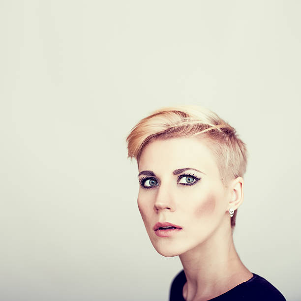 istock woman with short stylish hairstyle 459317563