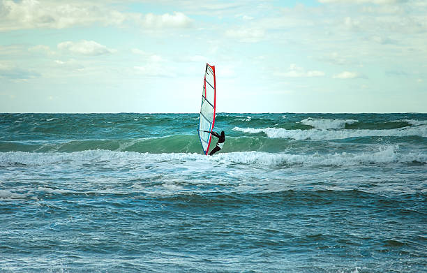 istock Sea Windsurfing Sport sailing water active leisure Windsurfer training 459323749
