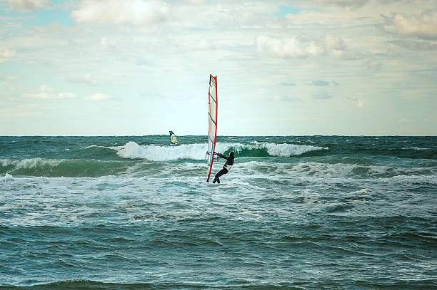 istock Sea Windsurfing Sport sailing water active leisure Windsurfer training 459323751