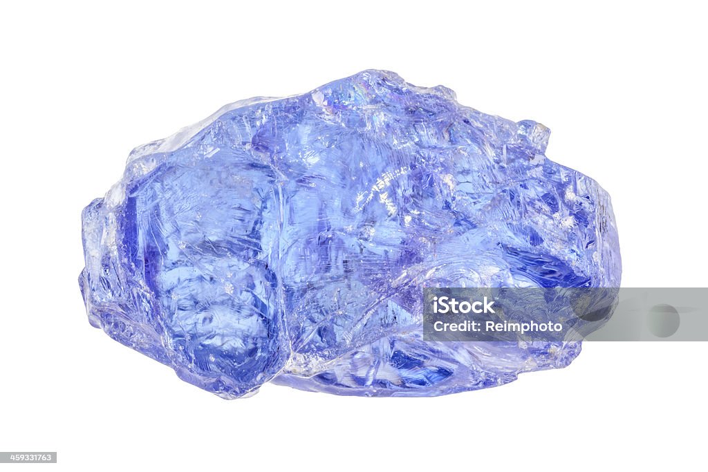 Uncut blue Tanzanite One raw uncut brightly blue Tanzanite crystal Tanzanite Stock Photo