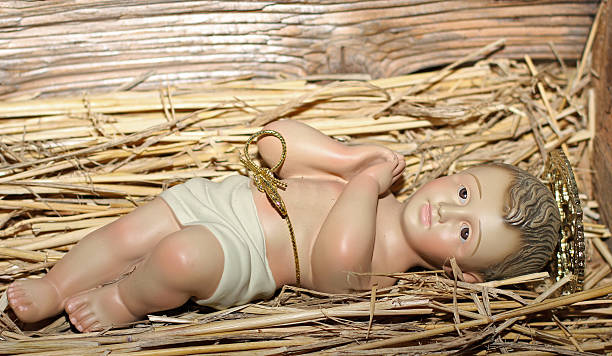 istock Baby Jesus is laid in the cradle 459332715
