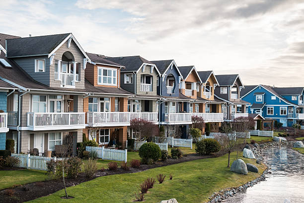 istock Modern houses all in a row next to each other 459334411