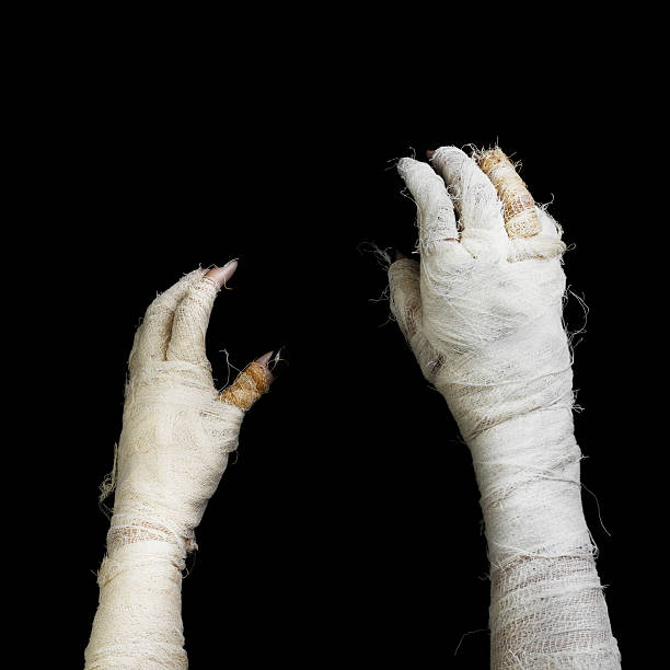 Two hand of mummy Two hand of mummy on dark background. mummified stock pictures, royalty-free photos & images