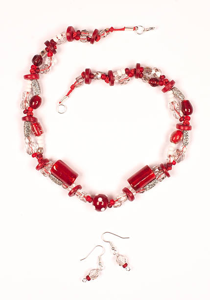 istock Necklace and  earrings on white background 459335463