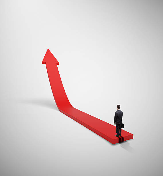 istock businessman and red arrow 459340357
