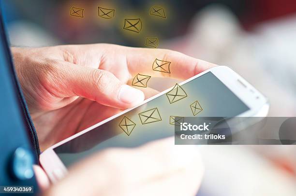 Man Using A Phone To Send And Receive Emails Stock Photo - Download Image Now - E-Mail, Pushing, Adult