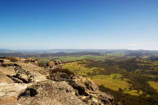 A bench at Hassans Walls Lookout, Lithgow, overlooking the Hartley Valley. Hassans Walls is the highest lookout in the Blue Mountains.
