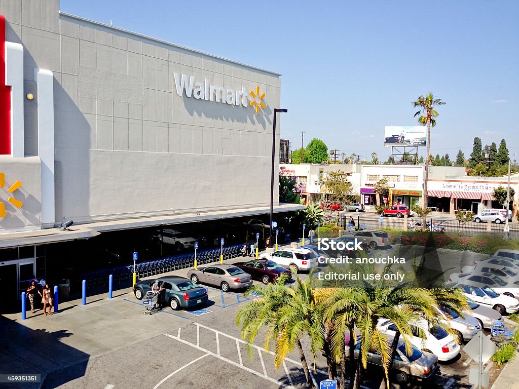 Walmart, Los Angeles, CA Los Angeles, USA - May 10, 2013: Walmart and parking lot nearby, few people on parking, Los Angeles, CA Wal-mart Stock Photo