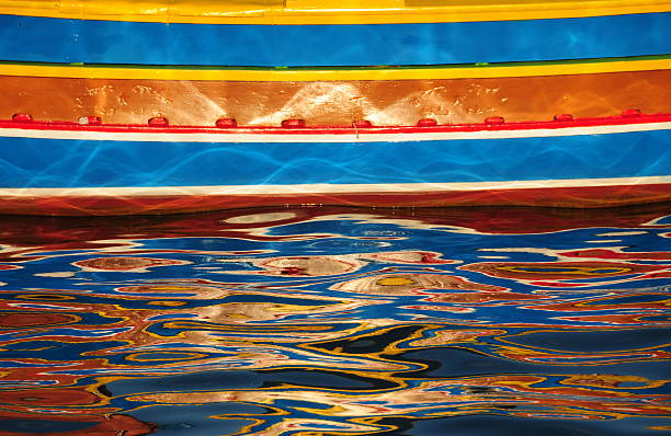 Traditional Maltese boats moored in the bay