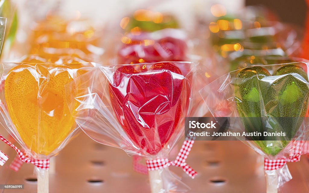 Heart Shaped Lollipops: Yellow, Red, and Green Yellow, red and green heart-shaped lollipops Candy Stock Photo