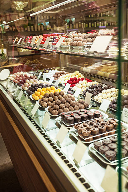 istock Lot of different chocolate truffles in store 459360657