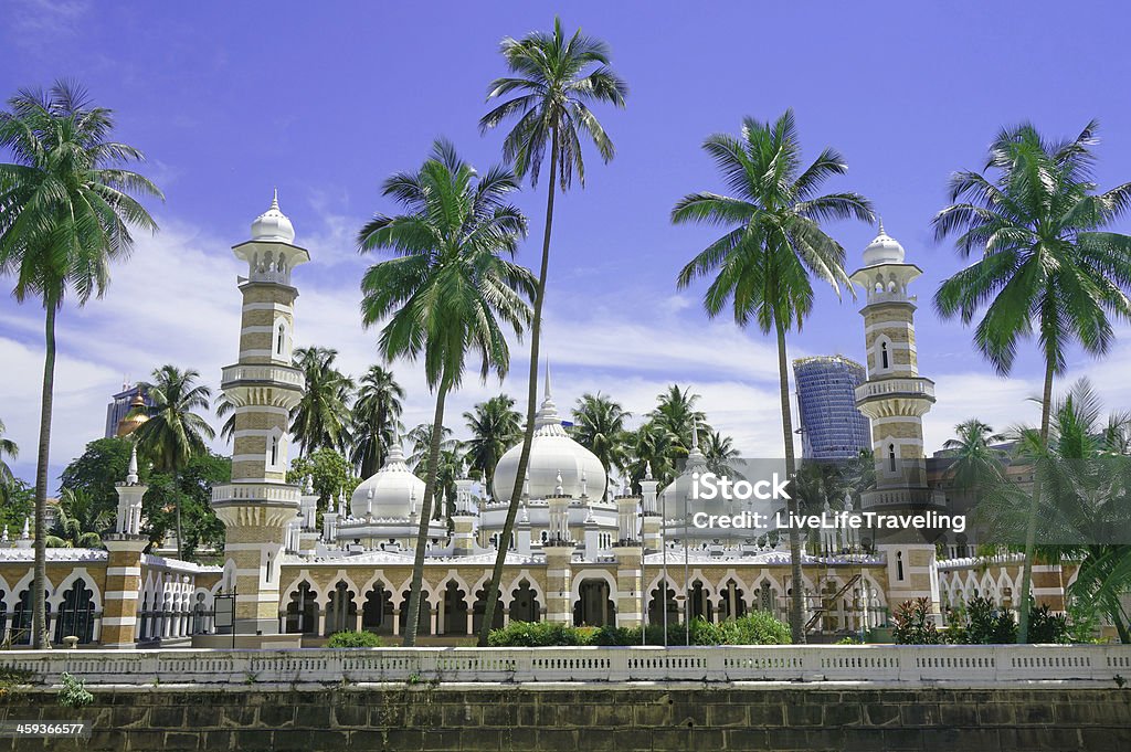 Landscape of Jamek Mosque, Kuala Lumpur with trees in front Jamek Mosque (Masjid Jamek), one of the oldest mosques in Kuala Lumpur, Malaysia. Kuala Lumpur Stock Photo