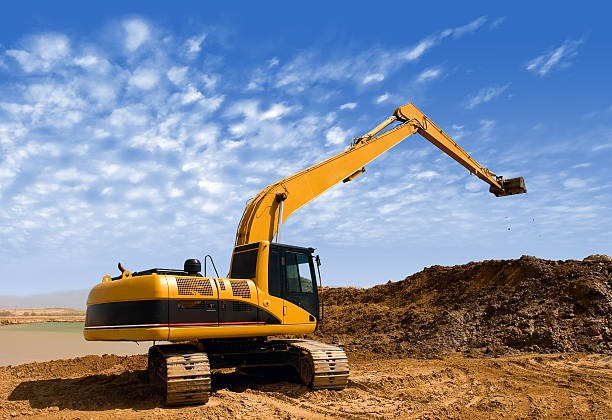 istock Orange excavator at Construction irrigation canal in Desert 459369167
