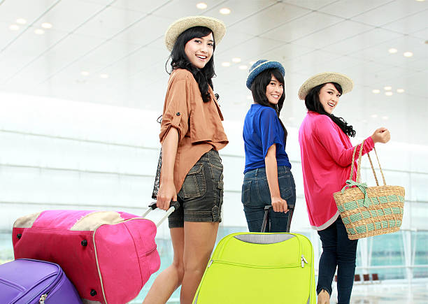 istock Happy girls going on vacation 459373453