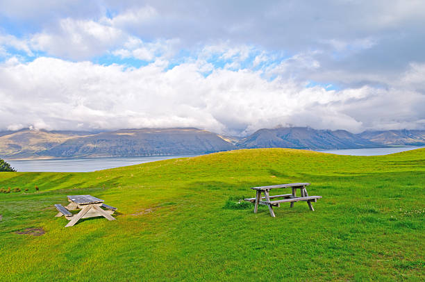 Picnic Tables on a Quiet Meadow in Braemar Station in New Zealand