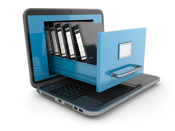 istock File cabinet with ring binders coming out of a laptop 459378585