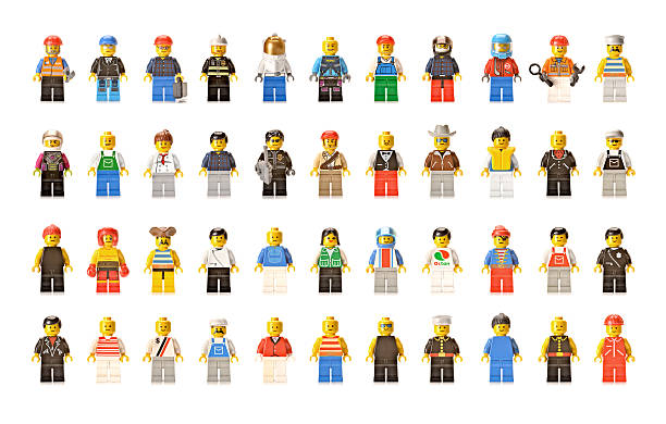Lego figures men and women Forest Row, East Sussex, UK - November 30th 2011: Lego Men shot in home studio on white.  lego stock pictures, royalty-free photos & images