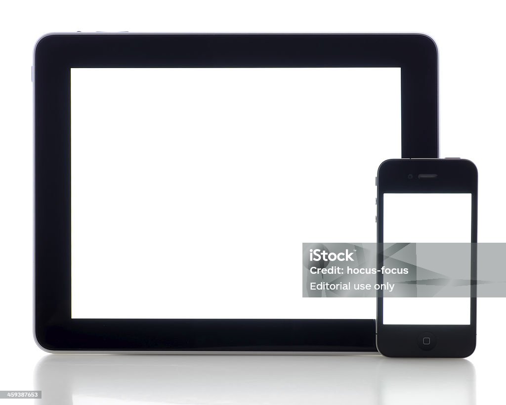 iPad and iPhone 4 with white screen Astanbul, Turkey - November 14, 2011: iPad and iPhone 4 displaying a blank white screen. The iPad, the digital tablet with multi touch screen produced by Apple Computer, Inc. The iPhone 4 is a touchscreen slate smartphone and the fourth generation iPhone, developed by Apple Inc. Apple Computers Stock Photo