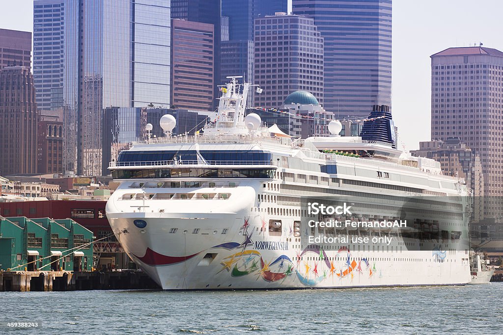 Norwegian Star docked in Seattle Seattle, USA - August 20, 2011: Norwegian Star docked in Seattle Washington with the Seattle skyline as background Cruise - Vacation Stock Photo