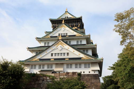 Osaka, Japan - September 11, 2010 : Osaka Castle is the most famous castle in Japan. It is located in Chuo-ku, Osaka, Japan. The castle is open to the public and it is a main tourist attraction in Osaka, Japan. Some people are at the observation deck in Osaka Castle.