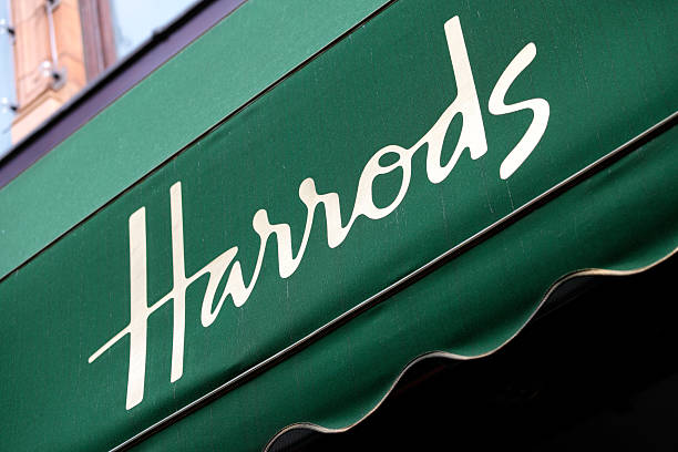 Harrods Department Store entrance canopy London, United Kingdom - September 18, 2011: Advertising canopy over the entrance of the famous Harrods department store in Knightsbridge London. harrods photos stock pictures, royalty-free photos & images