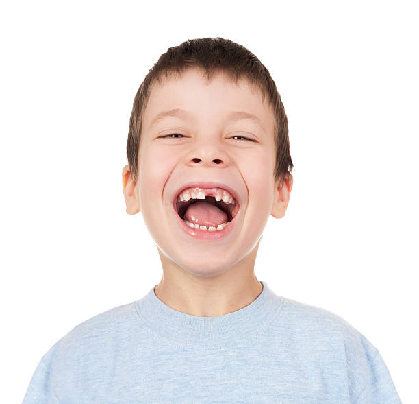 istock Boy portrait with a lost tooth 459393547