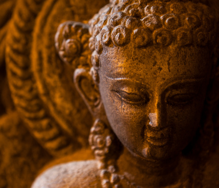 Close up of a statue of Buddha taken in Swayambhunath, the Monkey Temple