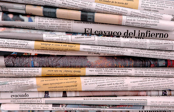 Pile of spanish newspapers stock photo