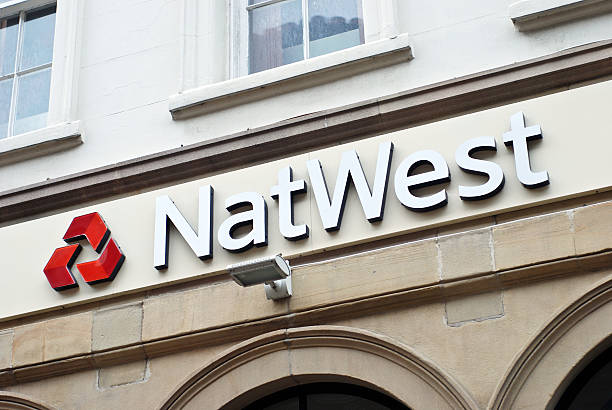 Sign of Natwest in Chester Chester, England - March 5, 2011: Sign of Natwest bank in Chester. NatWest is the largest retail and commercial bank in the United Kingdom. chester england stock pictures, royalty-free photos & images